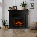 Camino elettrico da terra Cambridge in legno Nero 110x36x100 Divina Fire ambientazione